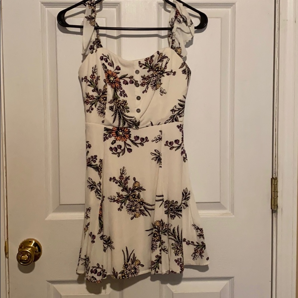 Off white off the shoulder floral dress.